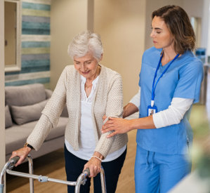 Caregiver assisting senior