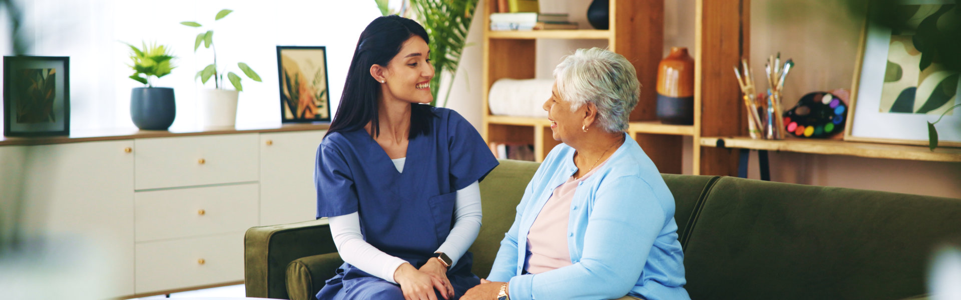 caregiver and senior smiling