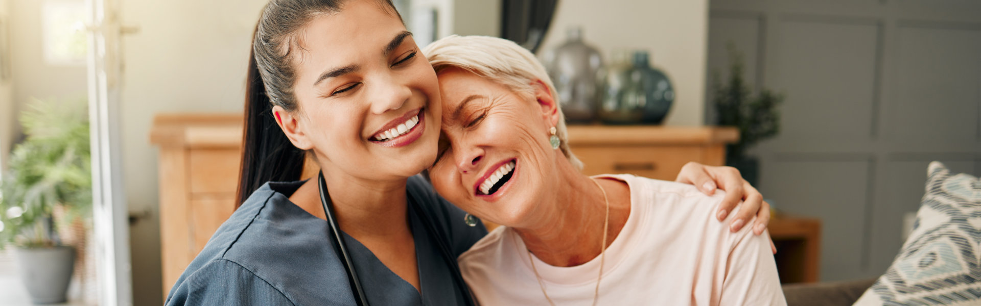 caregiver and senior smiling